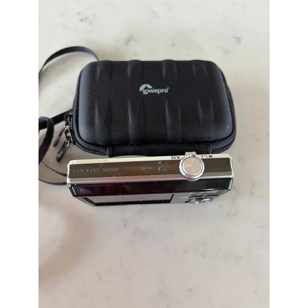 Nikon Coolpix S6000 Digital Camera 14.2MP 7x Zoom Silver with Lowepro Case